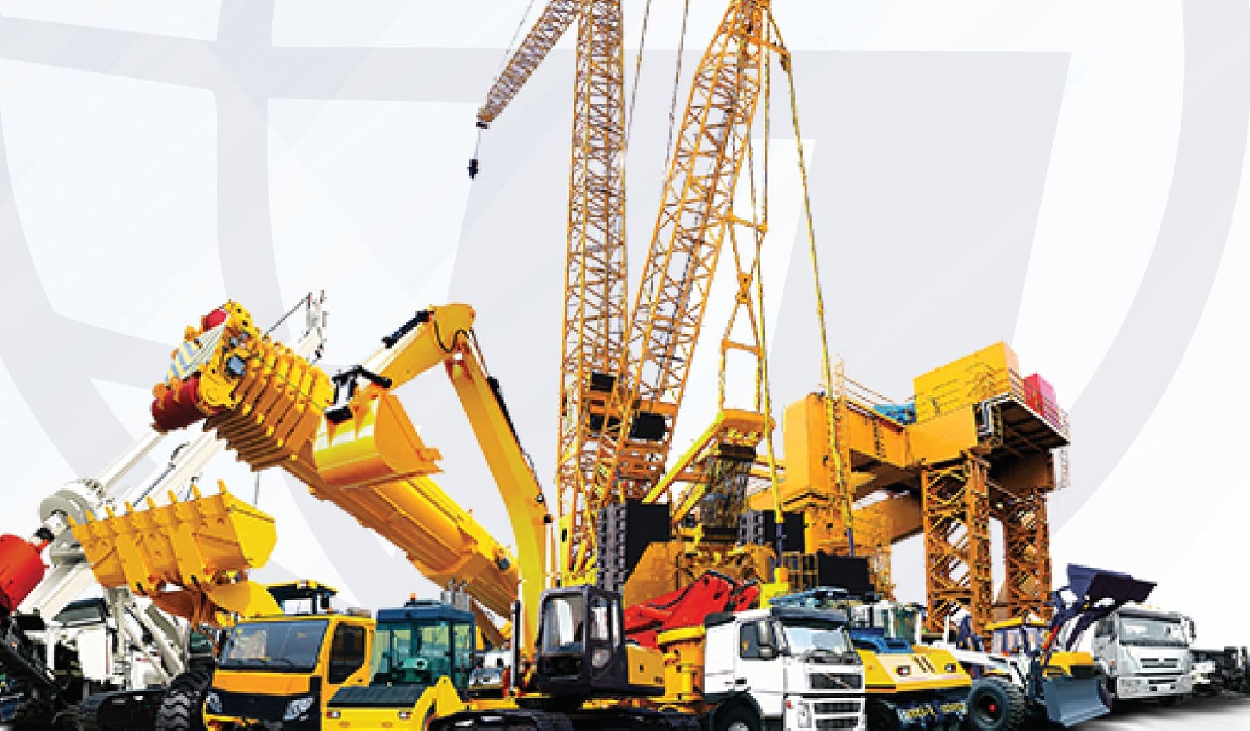 Fleet of heavy construction machinery including cranes and excavators